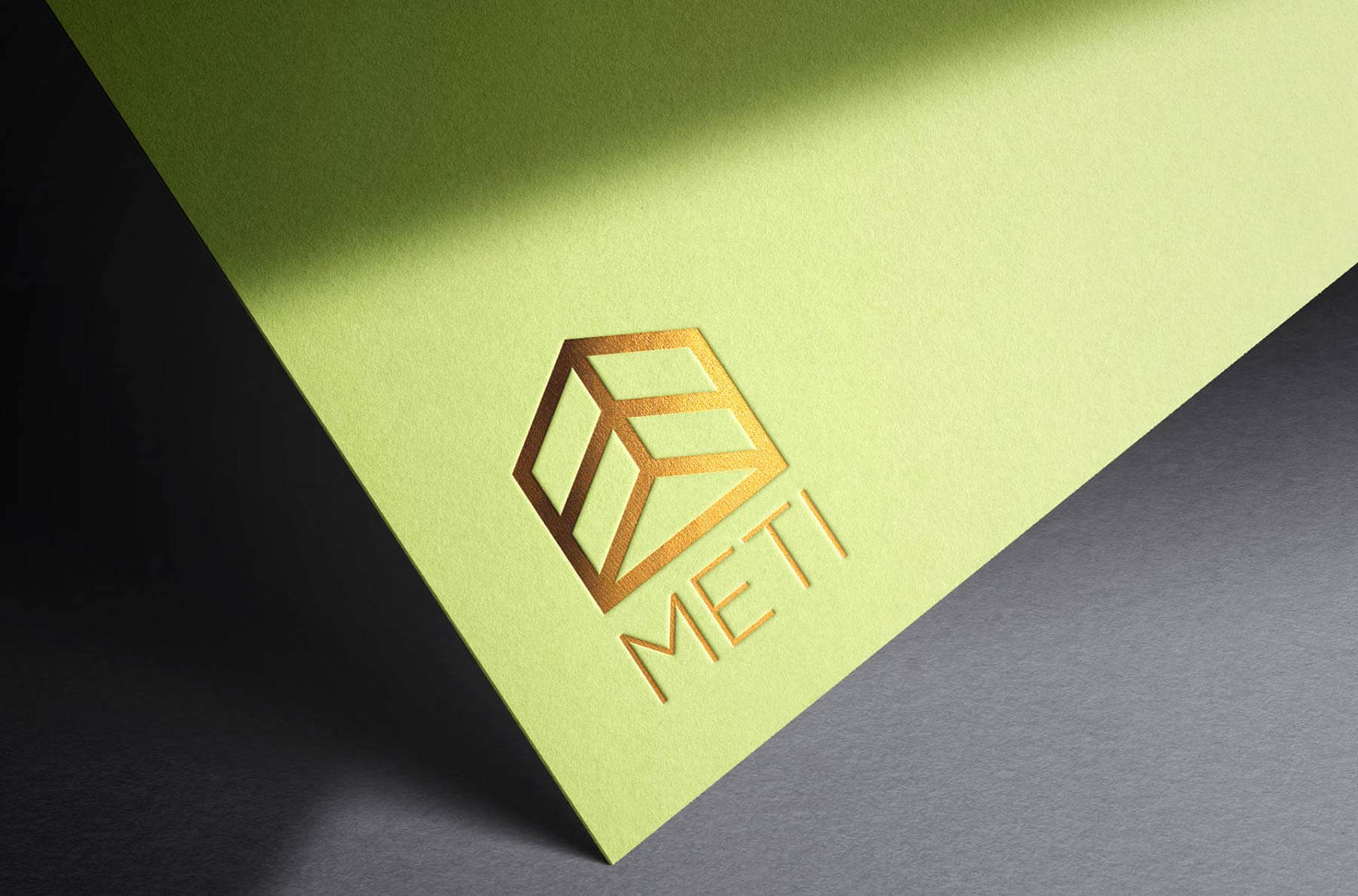 Logo e brand identity di Meti realizzato da SEBA! grafico di Gravellona Toce nel VCO di marchio dorato su cartelletta verde
