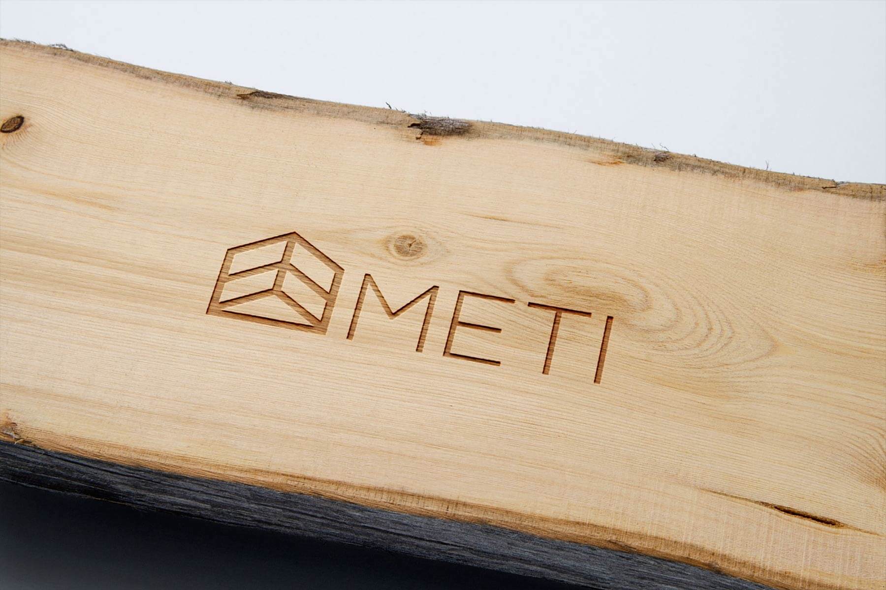 Logo e brand identity di Meti realizzato da SEBA! grafico di Gravellona Toce nel VCO dell'incisione del logo su legno